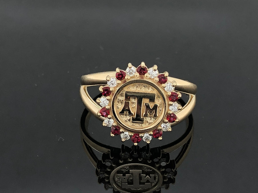 Student adding a special sparkle to Aggie rings